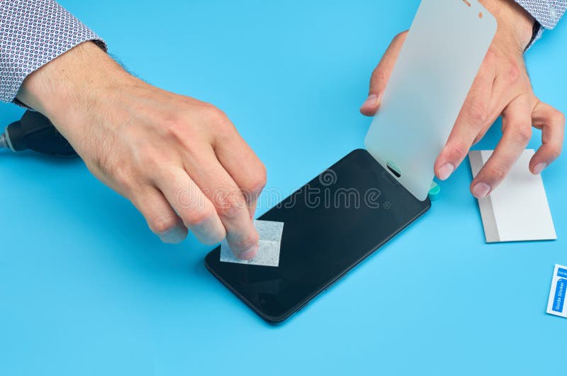 The Man Replacing the Broken Tempered Glass Screen Protector for