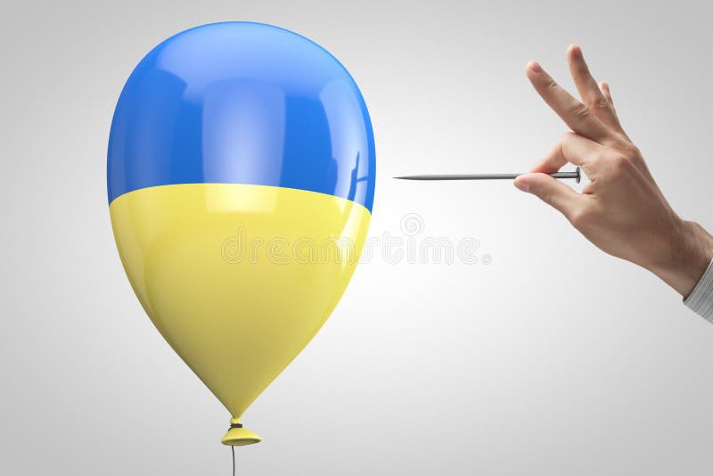 Hand with a needle trying to pierce a balloon with Ukrainian symbols. Hand with a needle trying to pierce a balloon with Ukrainian symbols.