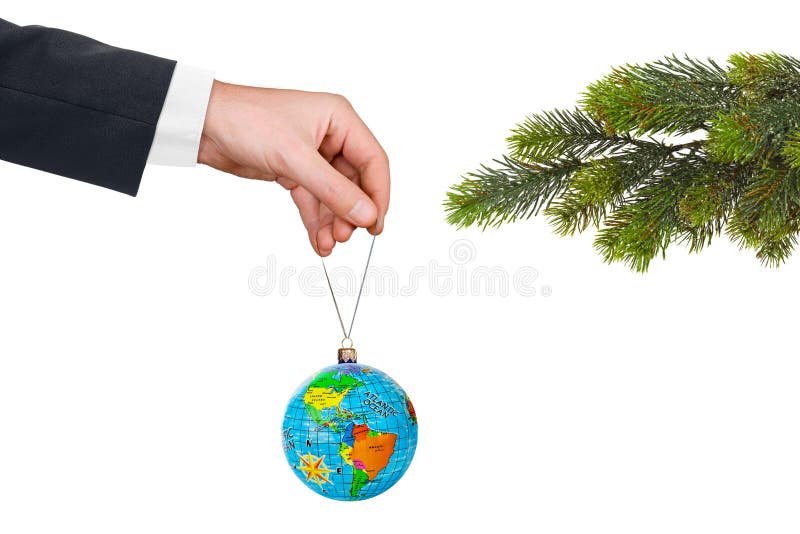 Hand with earth and Christmas tree isolated on white background. Hand with earth and Christmas tree isolated on white background