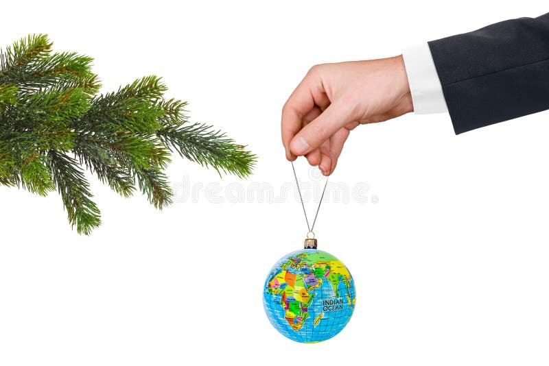 Hand with earth and Christmas tree isolated on white background. Hand with earth and Christmas tree isolated on white background