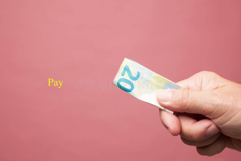 Hand met euro van wettig betaalmiddel, euro muntstuk royalty-vrije stock fotografie Hand met euro van wettig betaalmiddel, euro muntstuk royalty-vrije stock fotografie