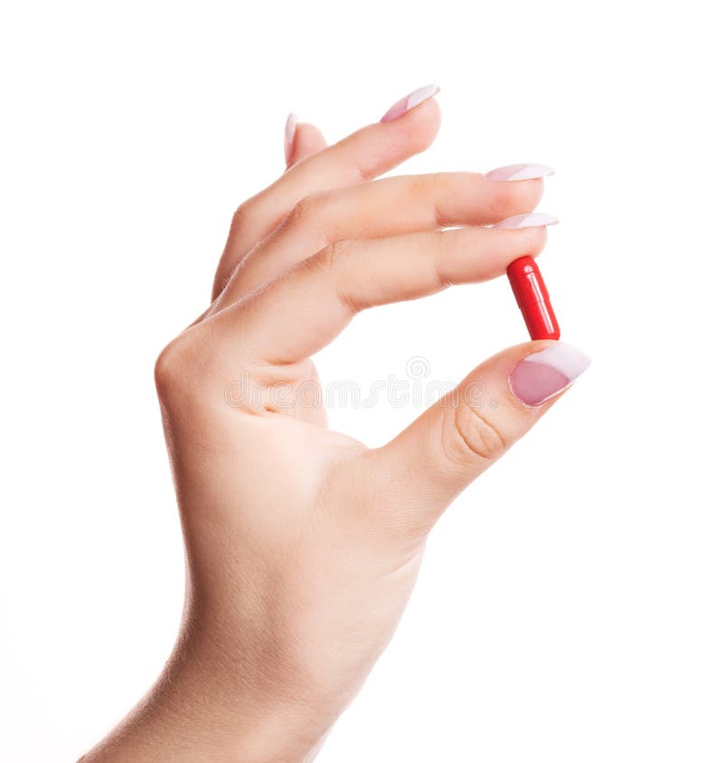 Hand mit einer Pille