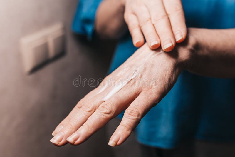 Hand Moisturizing Mask Apply a Thick Layer of Cream Stock Image