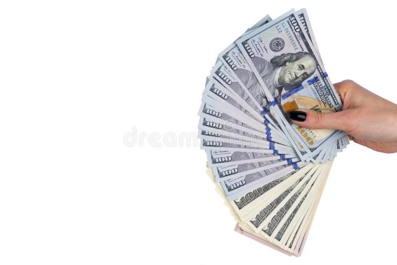 Hand with money isolated on white background. US Dollars in hand. Handful of money. Business woman offering money. Counting money.