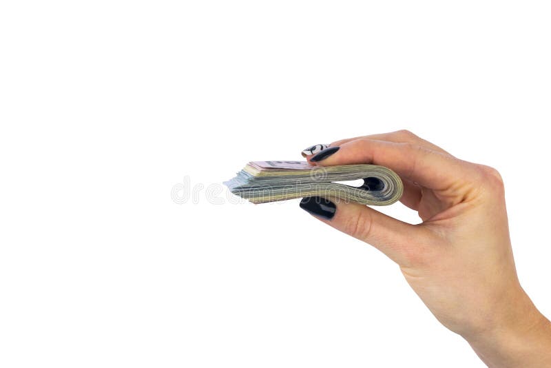 Hand with money isolated on white background. US Dollars in hand. Handful of money. Business woman offering money. Counting money.