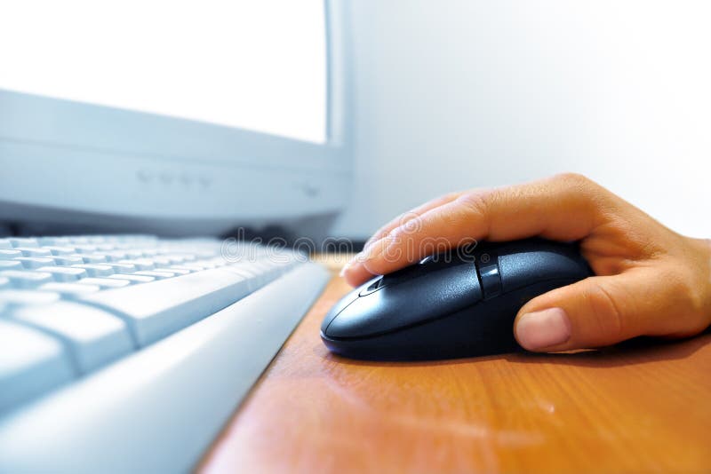 Hand on the mouse royalty free stock image