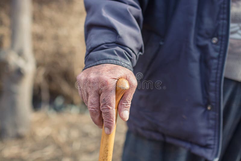 Hand of a old man holding a cane stock photography Hand of a old man holding a cane stock photography