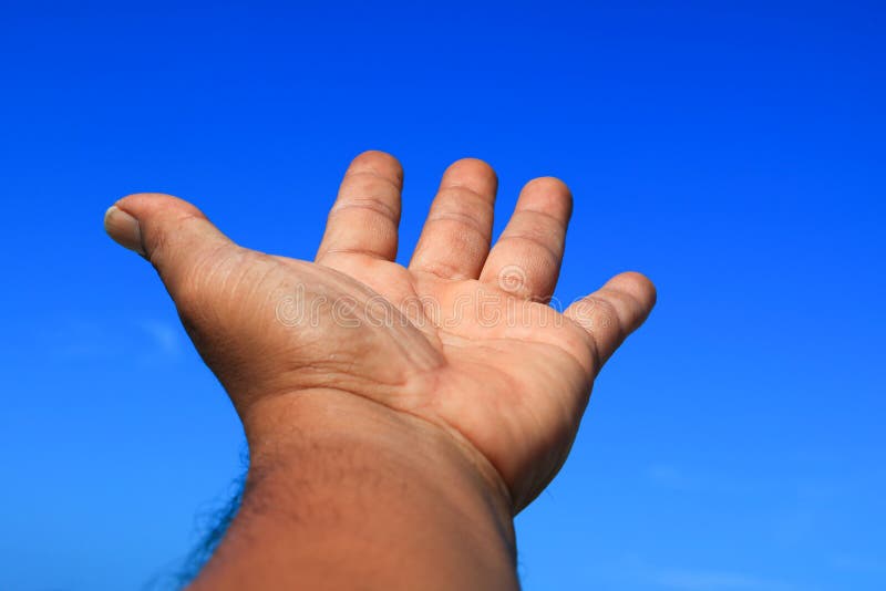 Hand open on sky background stock photography