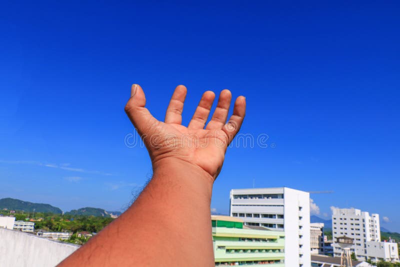 Hand open on sky background stock photography