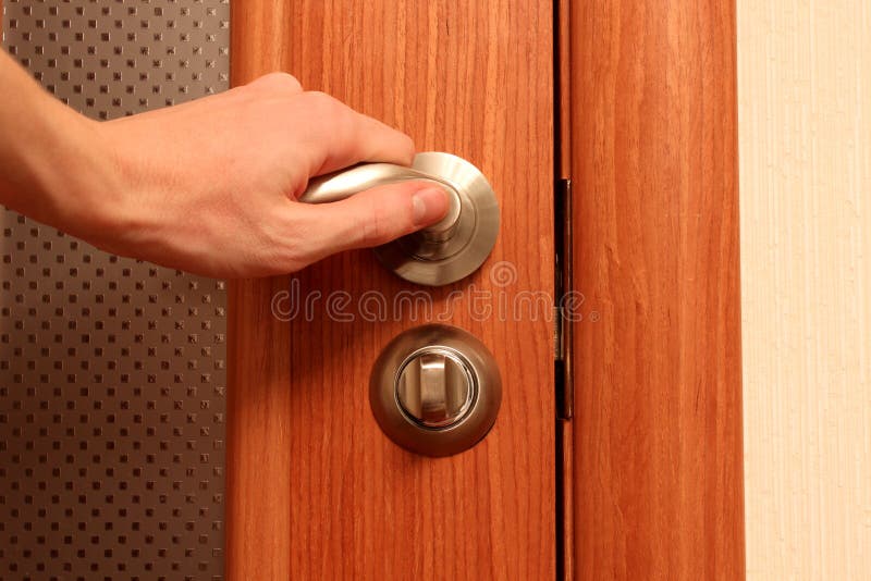 The hand opening a door royalty free stock photos