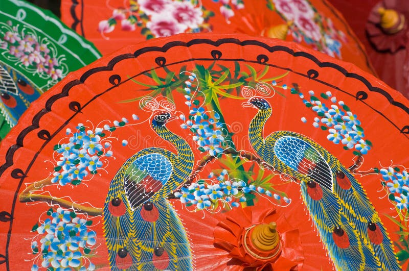 Hand painted orange umbrellas in Thailand