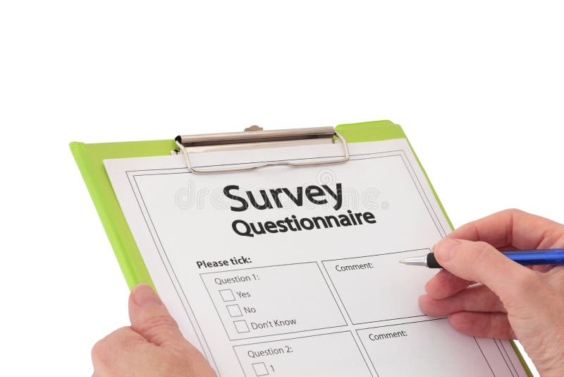 Hand with Pen Completing Market Research Survey Qu stock photos