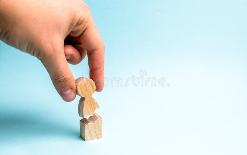The hand of the person collects a figure of the person together. Psychological assistance and support. Treatment of psychological royalty free stock image The hand of the person collects a figure of the person together. Psychological assistance and support. Treatment of psychological royalty free stock image