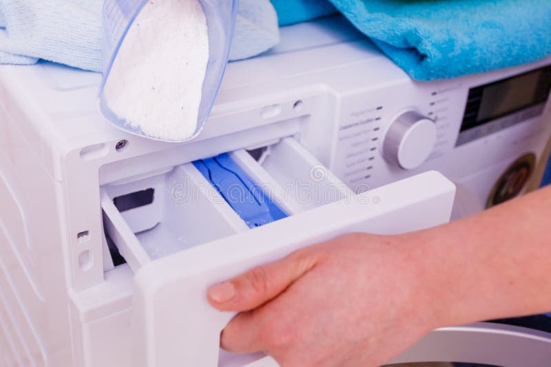 Hand Pour Washing Powder into Machine Stock Photo Image of appliance, container 169252012