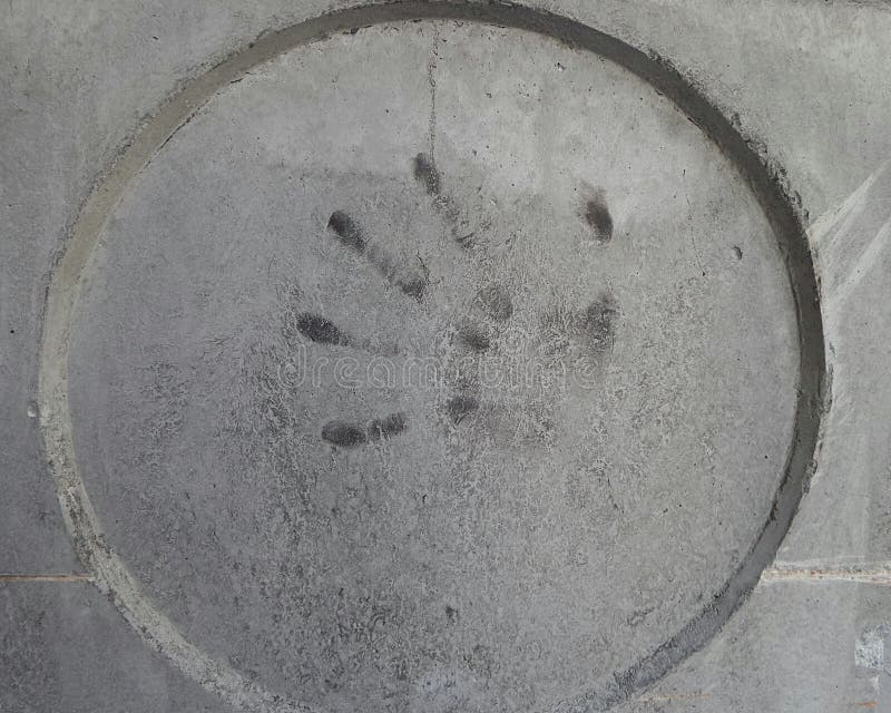 Hand print on cement wall stock image. Image of cement - 84594943