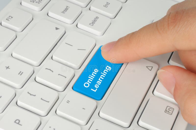 Hand pushing blue online learning button