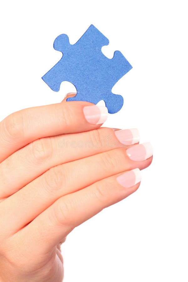 Hand and puzzle