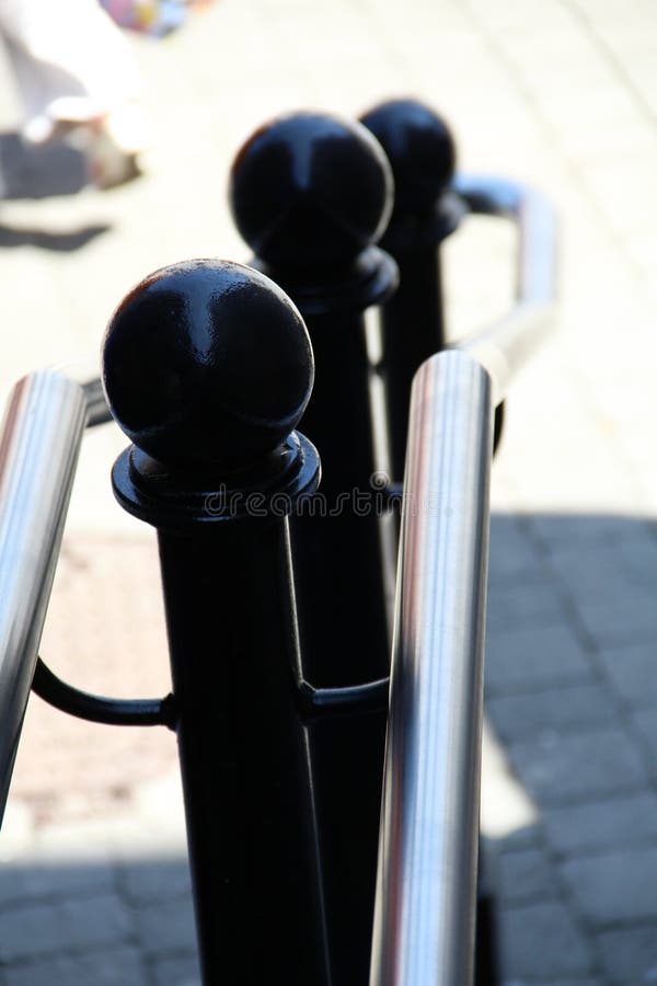 Hand rail with black metal posts inside stock photos