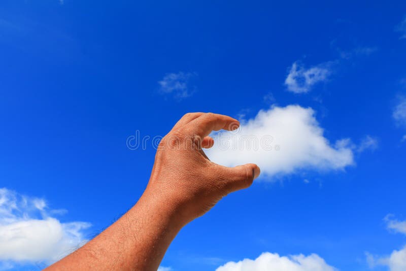 Hand reach out so it the on blue sky background stock images