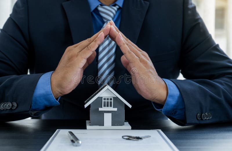 Hand a Real Estate Agent, Prevent the Home Model and Explain the Business  Contract, Rent, Buy, Mortgage, Loan, or Home Insurance Stock Photo - Image  of agent, construction: 189024516