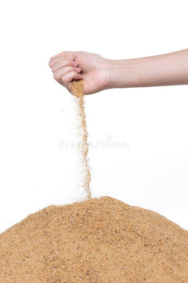 Hand releasing dropping sand. Fine Sand flowing pouring through fingers against white background. Summer beach holiday vacation