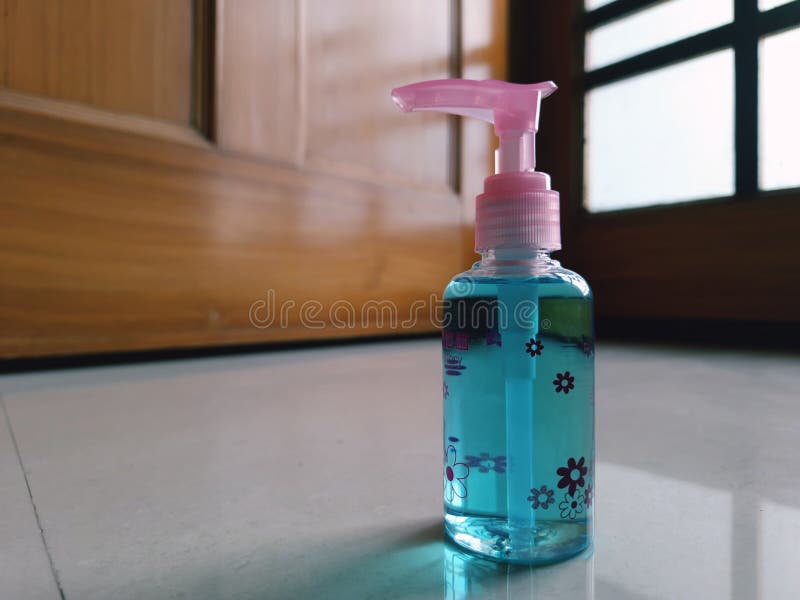 Hand sanitizer for keep away bacterial and viral diseases blue bottle stock image Hand sanitizer for keep away bacterial and viral diseases blue bottle stock image