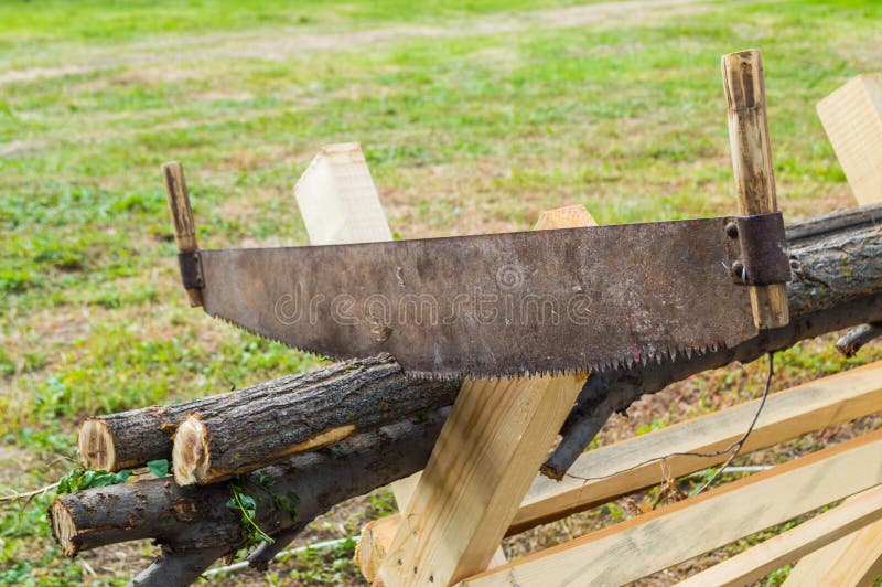 Hand saw in log stock photo. Image of object, sharp 204357652