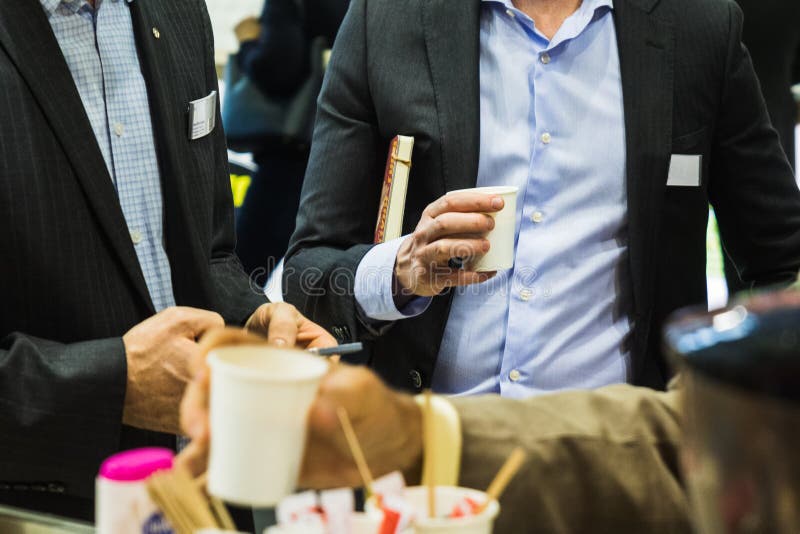 Hand Serving a Cup of Coffee Stock Photo Image of corporate, rich
