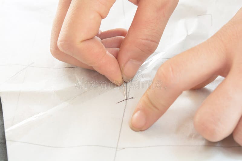 Hand and sewing clothes. stock photo. Image of material 127360904