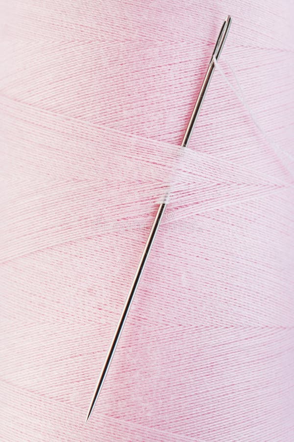 Hand Sewing Needle in Pink Thread Spool Stock Photo Image of