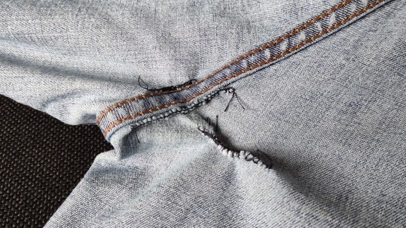 Hand-sewn Holes on Jeans, Seams from Sewing on the Inside of Denim ...