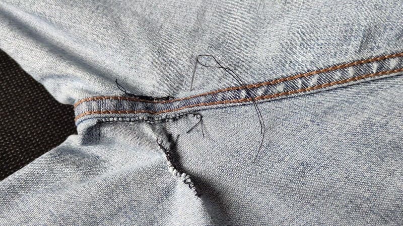 Hand-sewn Holes on Jeans, Seams from Sewing on the Inside of Denim ...