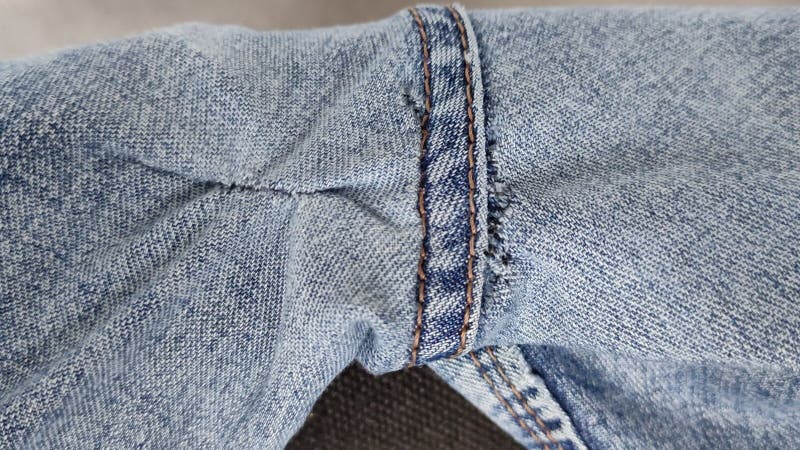 Hand-sewn Holes on Jeans, Seams from Sewing on the Outside of Denim ...