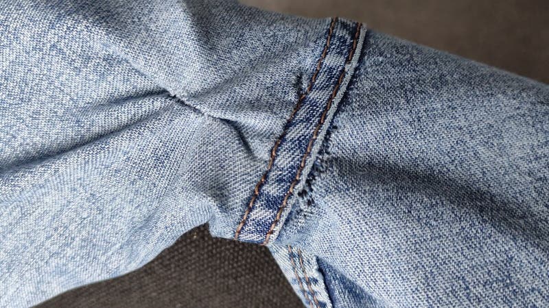 Hand-sewn Holes on Jeans, Seams from Sewing on the Outside of Denim ...