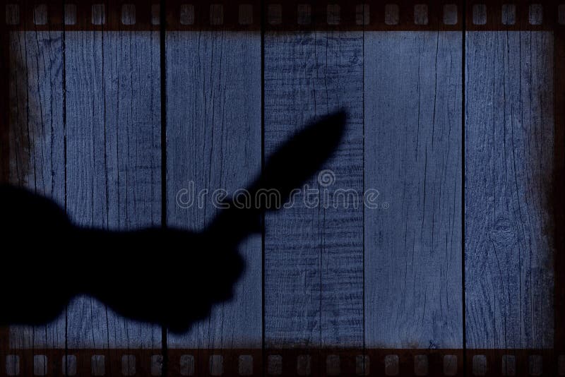 Hand Silhouette with knife on the Natural Wooden Panel royalty free stock photo Hand Silhouette with knife on the Natural Wooden Panel royalty free stock photo