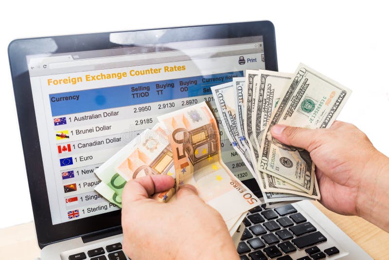 Hand sorting USD and EURO in front of currency exchange chart on