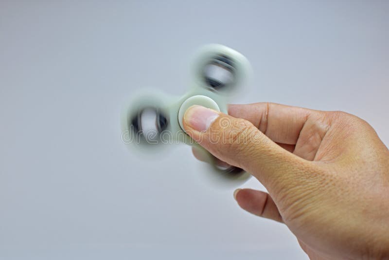 Hand Spinner Fidget stock photo. Image of relaxing, popular 93552470