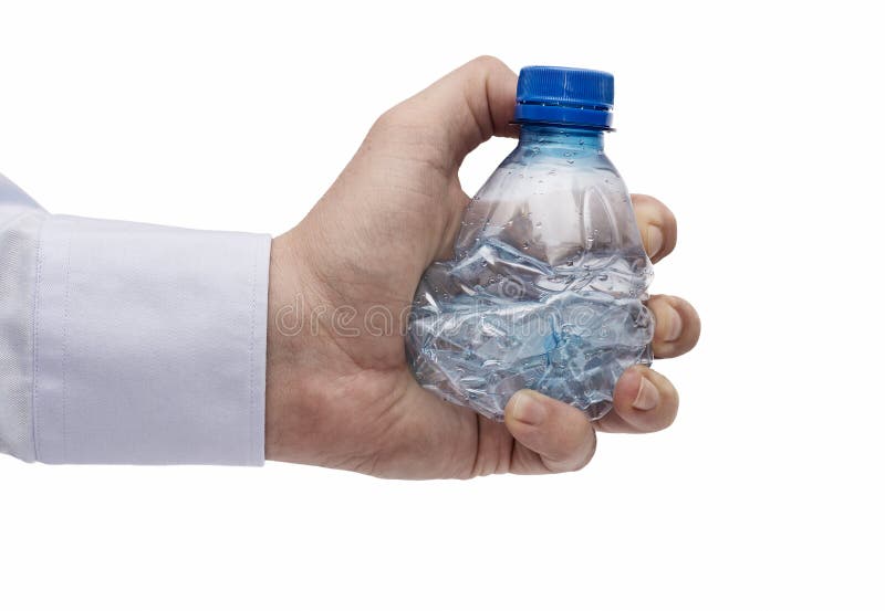 Hand squeezing Plastic bottle, PET royalty free stock photo Hand squeezing Plastic bottle, PET royalty free stock photo