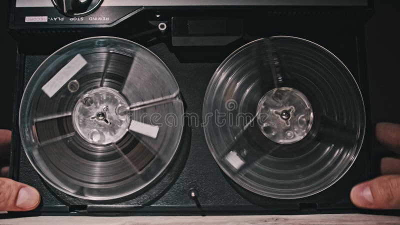 Hand Starts Vintage Reel to Reel Tape Player stock video footage
