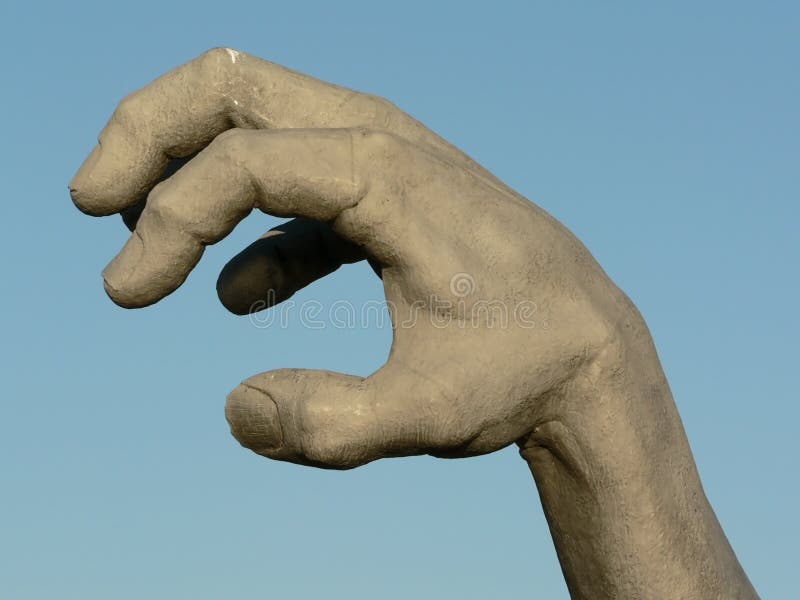 Hand statue 2 stock photo. Image of isolated, metal, reach 1506500