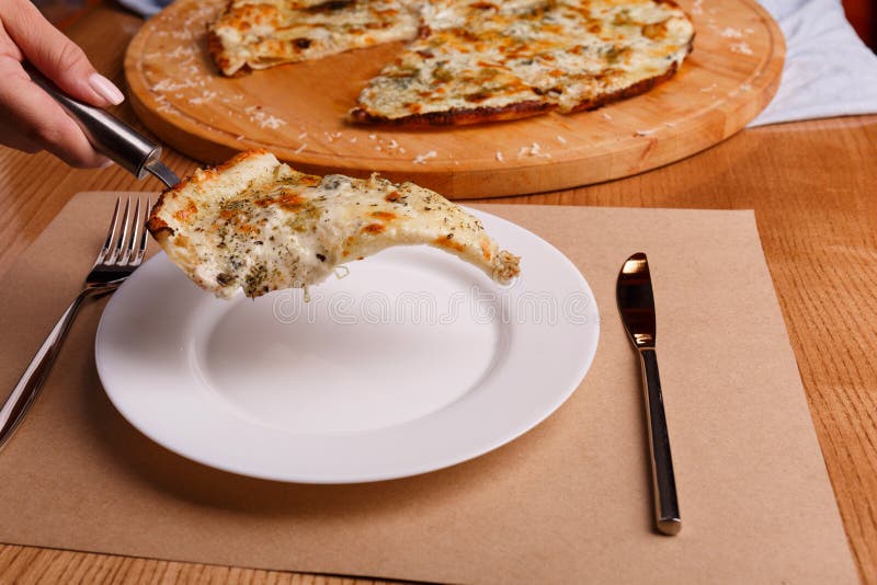 A Tasty Slice of Pizza on the Plate Stock Photo - Image of mozzarella ...