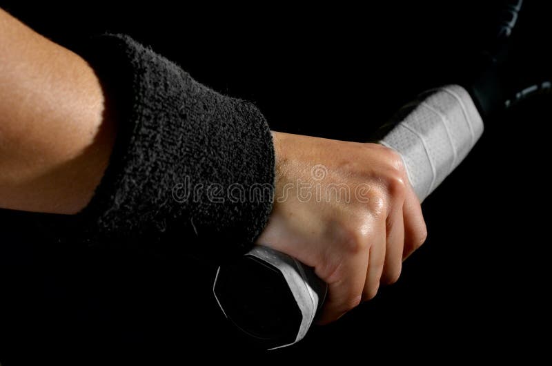 Hand on tennis racket stock image. Image of details, indoor 55930481