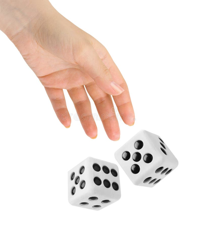 Hand throwing two dices.