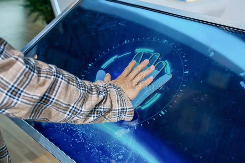 Hand touch screen to recognize the personal information and data. with smart system stock photography