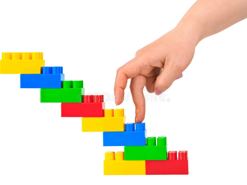 Hand and toy stairs stock image Hand and toy stairs stock image