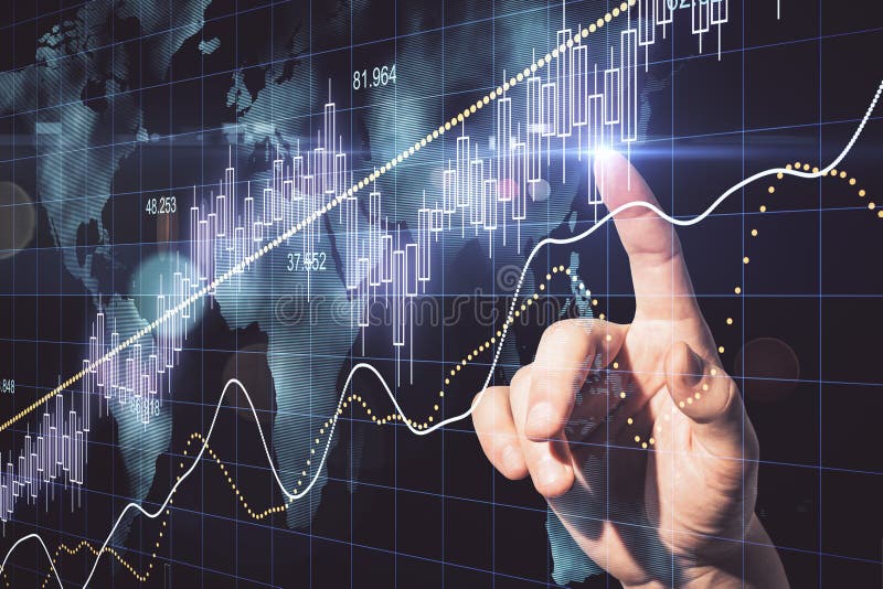 Hand using candlestick chart with digital world map hologram royalty free stock photo