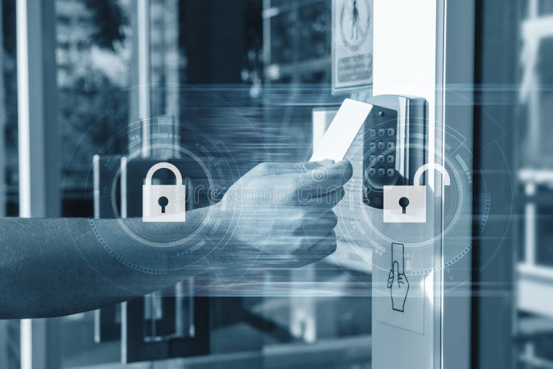 Hand using security key card unlocking the door to entering private building. Home and building security system royalty free stock photo