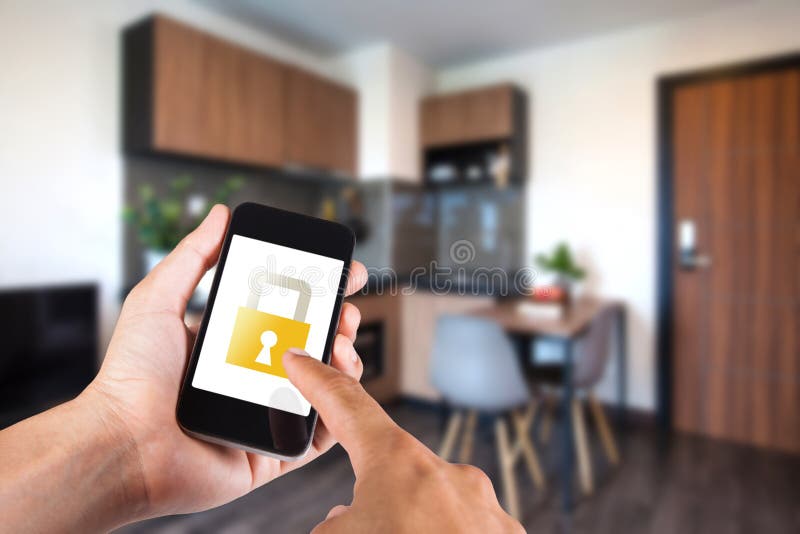 Hand using smartphone by app smart home on mobile for remote control everything in home by wifi network.