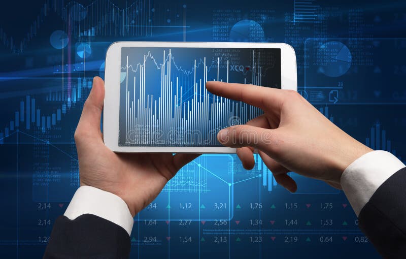 Hand using tablet and checking financial report concept. First person hand using tablet and checking financial report on cloud computing system