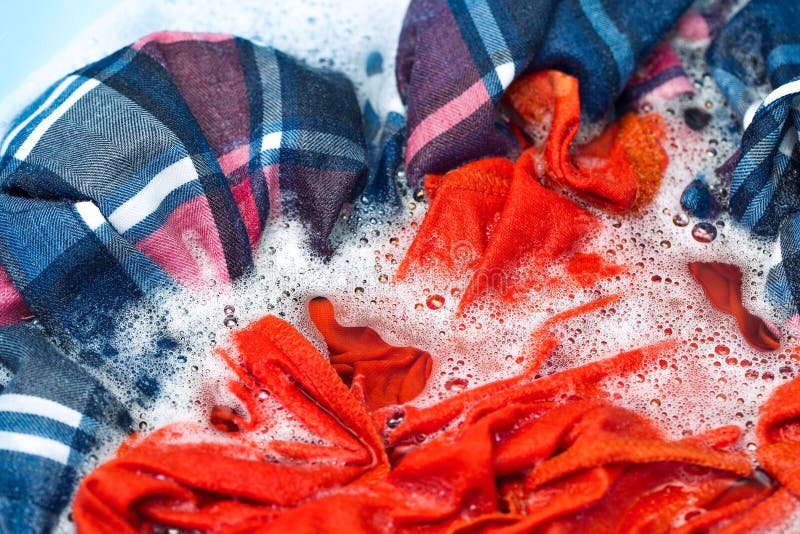 Hand washing clothes, soaking clothes in washing powder